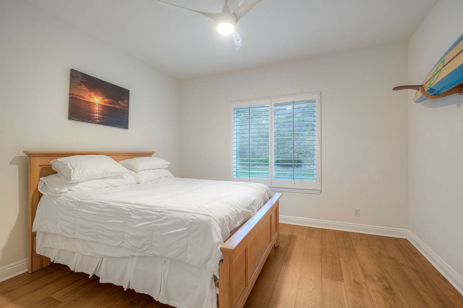 Bedroom with wood floors