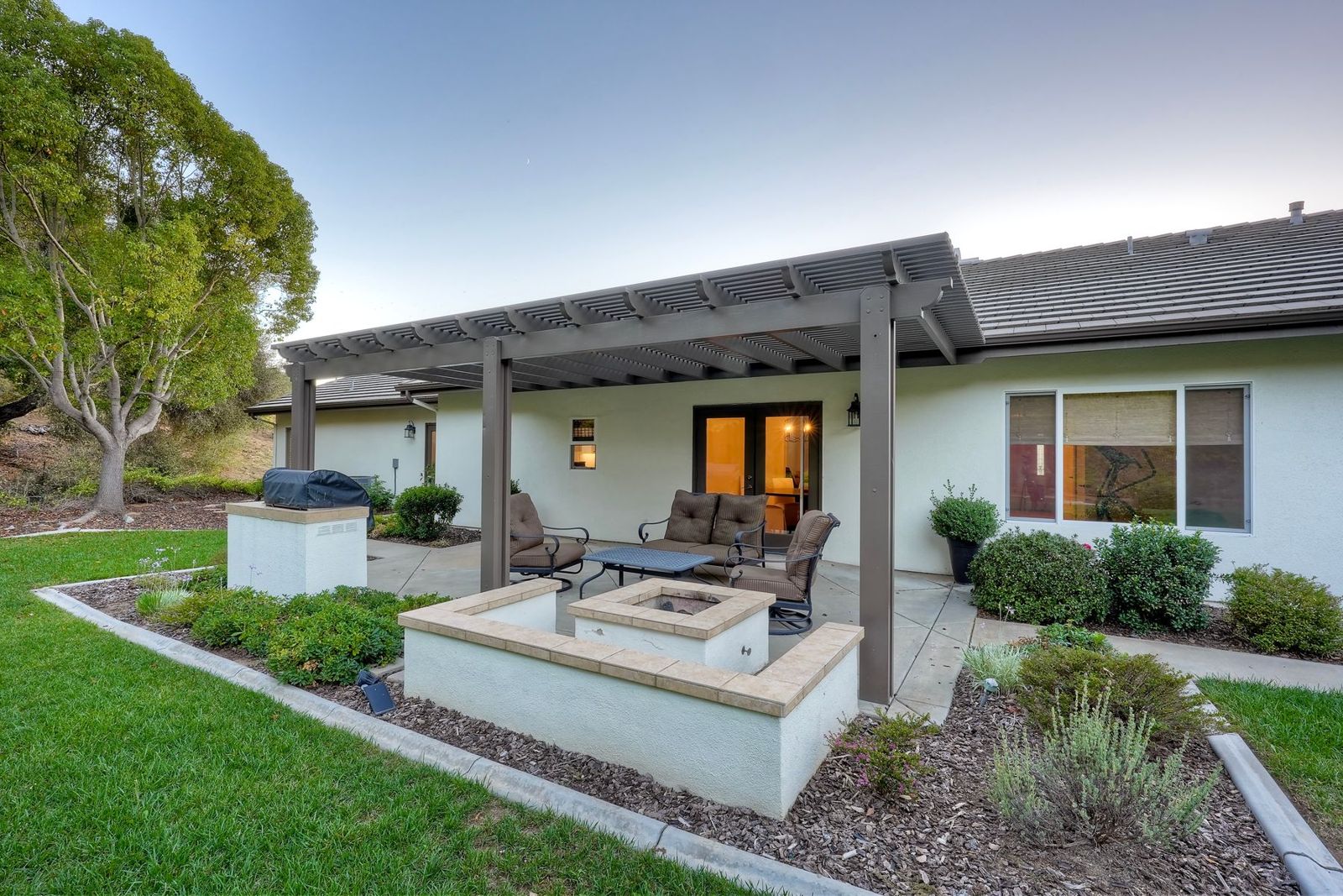 Patio with gas fire pit and built-in BBQ
